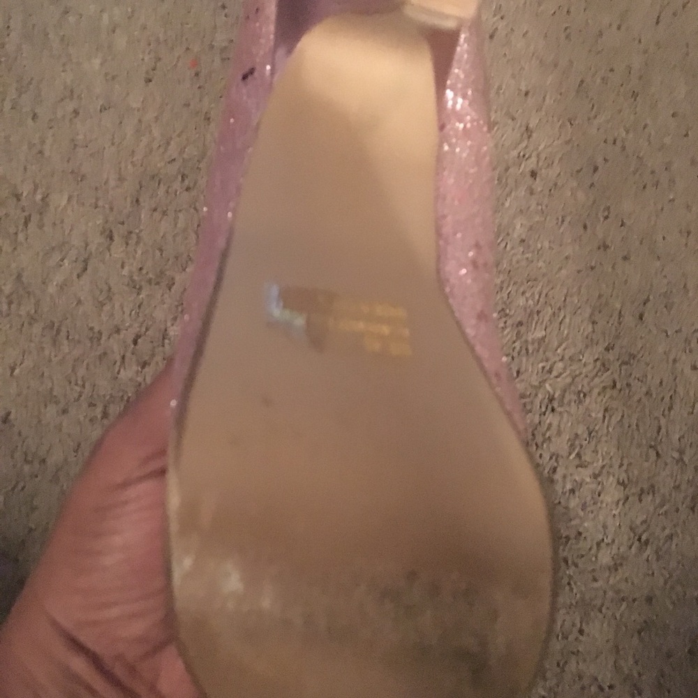 Used pair of  pink bling Qupid heels size 8.5